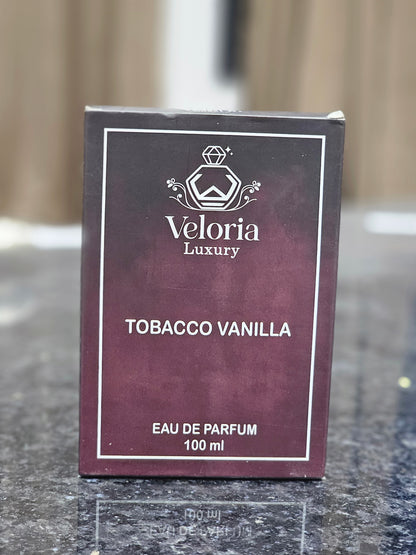 ‘TOBACCO VANILLA’ by ‘VELORIA LUXURY’ is an opulent, warm and iconic fragrance.It blends the Rich smoky notes of Tonacco leaf with the sweet, creamy essence of vanilla. The fragrance  features spicy notes.