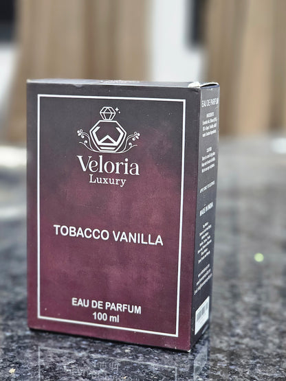 ‘TOBACCO VANILLA’ by ‘VELORIA LUXURY’ is an opulent, warm and iconic fragrance.It blends the Rich smoky notes of Tonacco leaf with the sweet, creamy essence of vanilla. The fragrance  features spicy notes.